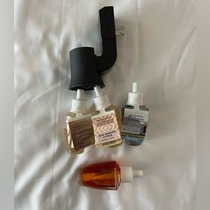 Bath and Body Works Wallflower Plug and Set of 4 Fragrance Refills.